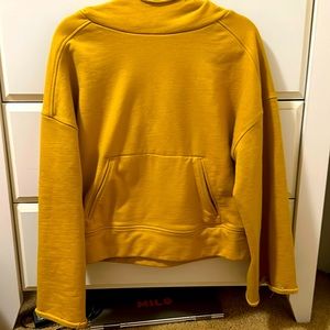 ALO Yoga Low Key Wide Sleeve Hoodie with Kangaroo Pocket Mustard Yellow